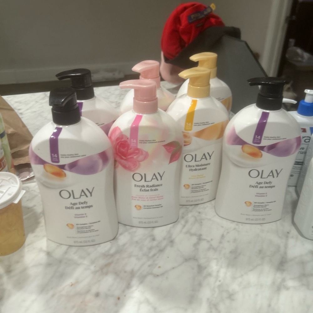 OLAY Skincare Collection with Black and Pink Pumps